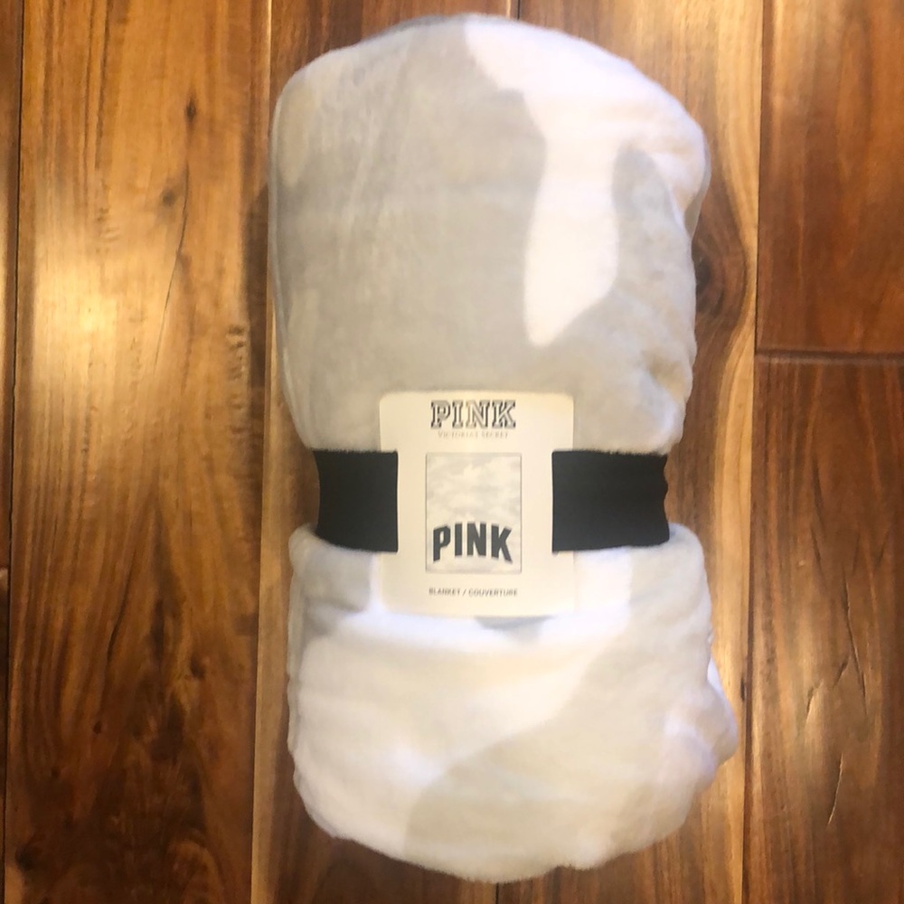 Pink Victoria’s Secret blanket.